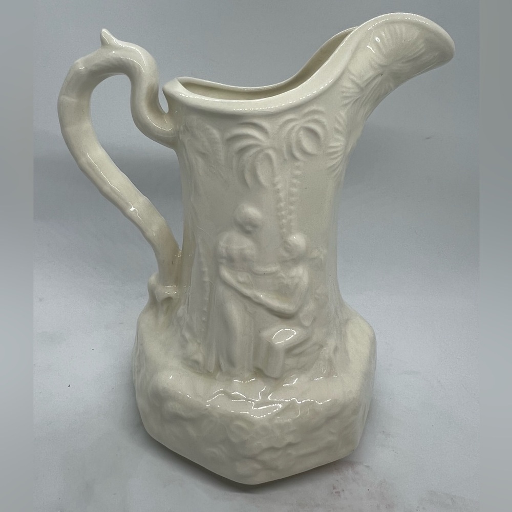 Source Unknown Cream White Ceramic Pitcher with Relief Scene